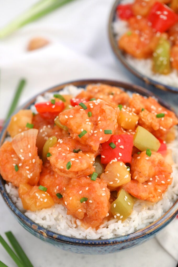 Sweet and Sour Shrimp is made with golden-crispy shrimp, healthy veggies, and coated in a delicious sweet and sour sauce. #shrimp #sweetandsour #sweetandsaourshrimp #chinesefood #sweetandsavorymeals