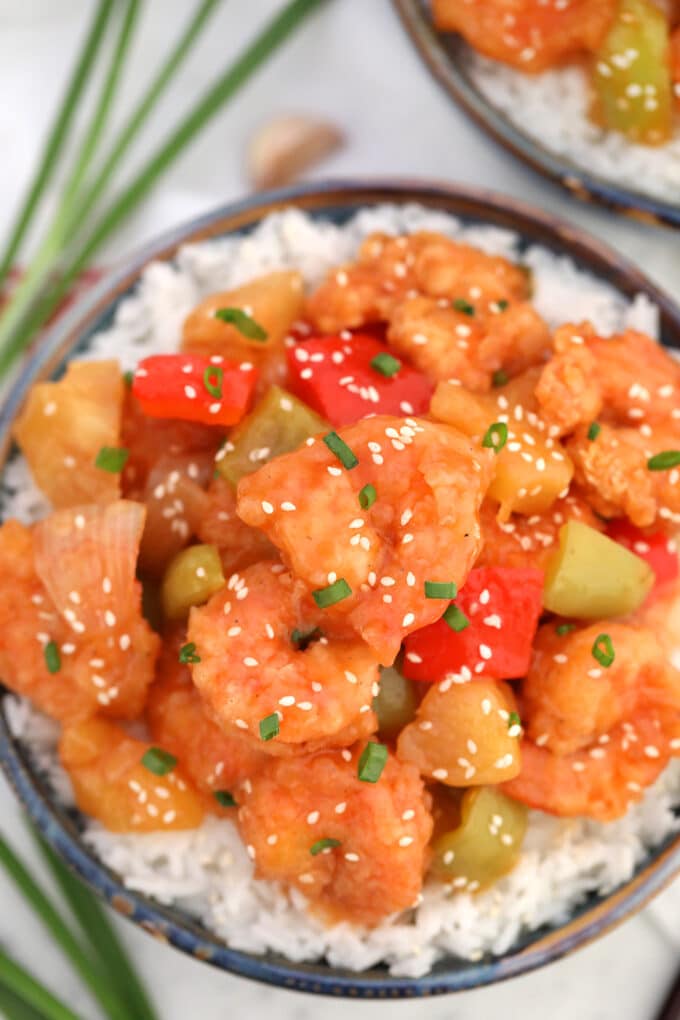 Sweet and Sour Shrimp is made with golden-crispy shrimp, healthy veggies, and coated in a delicious sweet and sour sauce. #shrimp #sweetandsour #sweetandsaourshrimp #chinesefood #sweetandsavorymeals