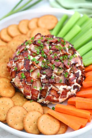 Bacon Ranch Cheese Ball is a creamy and flavorful ball of your favorite cheese combined with cream cheese and crispy bacon! #cheese #cheeseball #appetizers #baconranch #sweetandsavorymeals