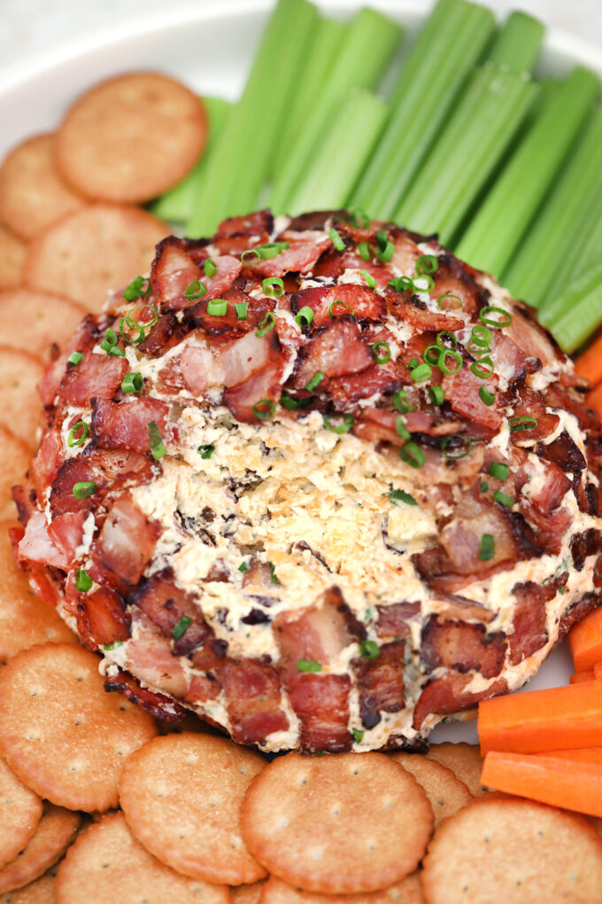 Bacon Ranch Cheese Ball is a creamy and flavorful ball of your favorite cheese combined with cream cheese and crispy bacon! #cheese #cheeseball #appetizers #baconranch #sweetandsavorymeals