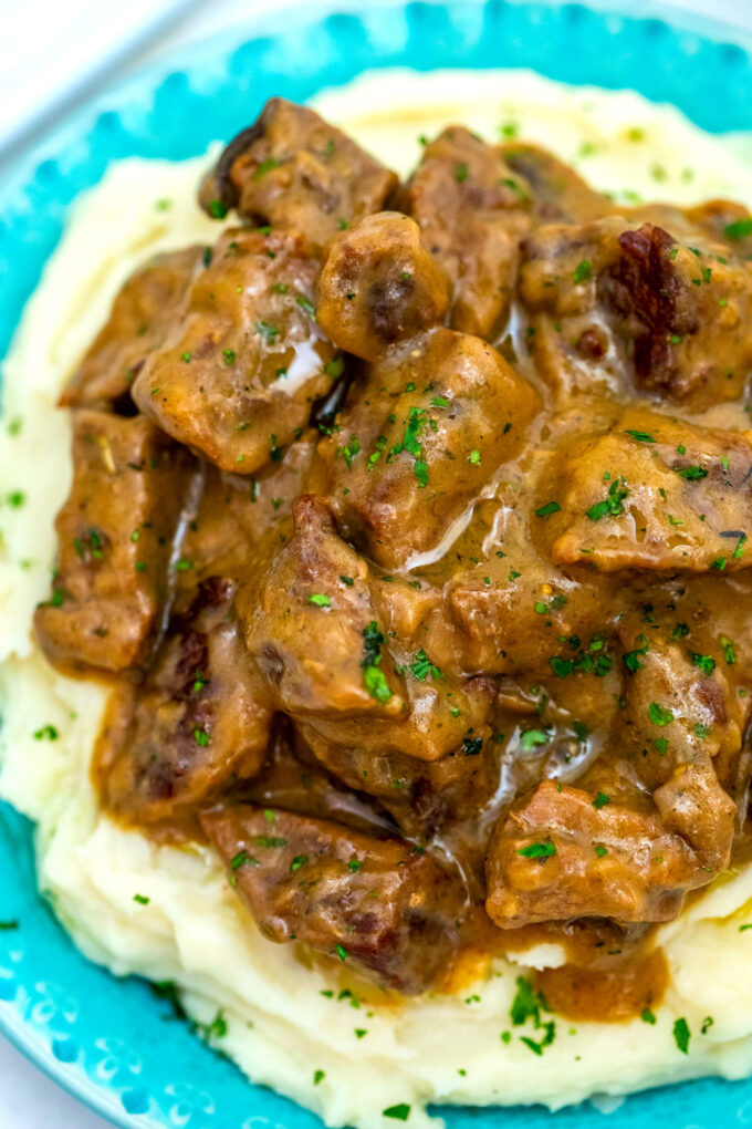 Beef Tips and Gravy is easily prepared on the stove with only a few basic ingredients but the result is tender meat in a thick savory sauce that everyone loves! #beeftipsandgravy #beefrecipes #beef #dinnerideas #sweetandsavorymeals