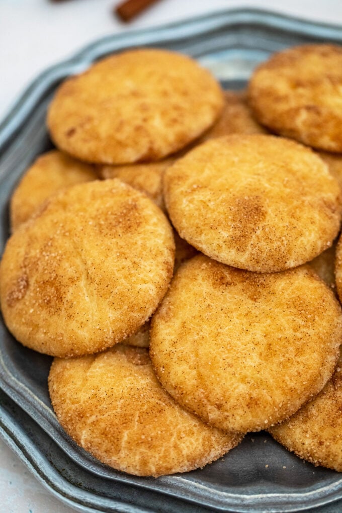 Picture of cinnamon cream cheese cookies on a silver plate.