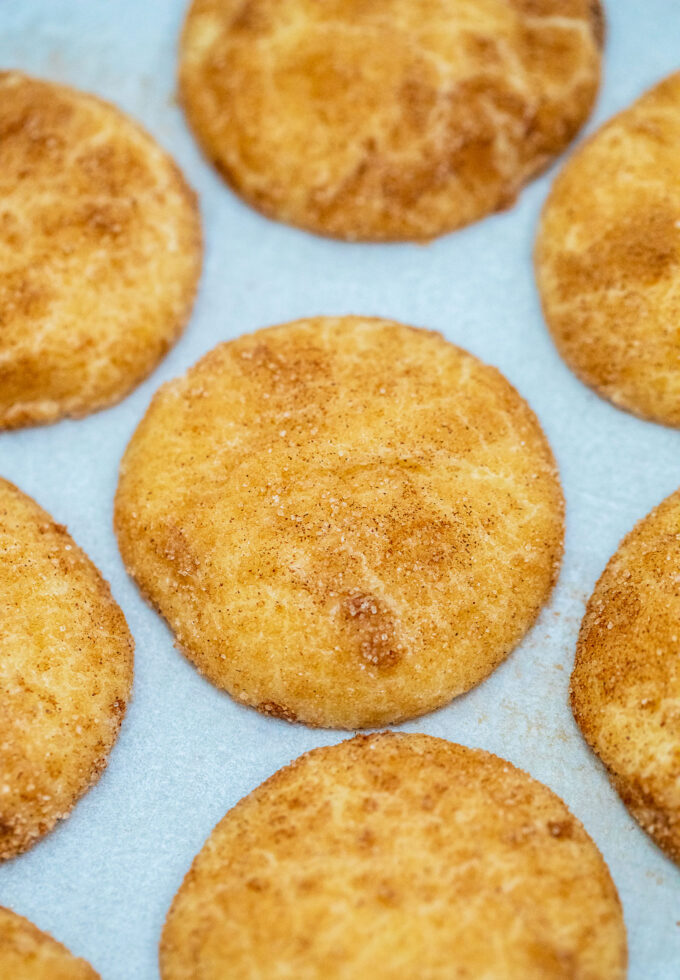 snickerdoodle cookies on a baking sheet