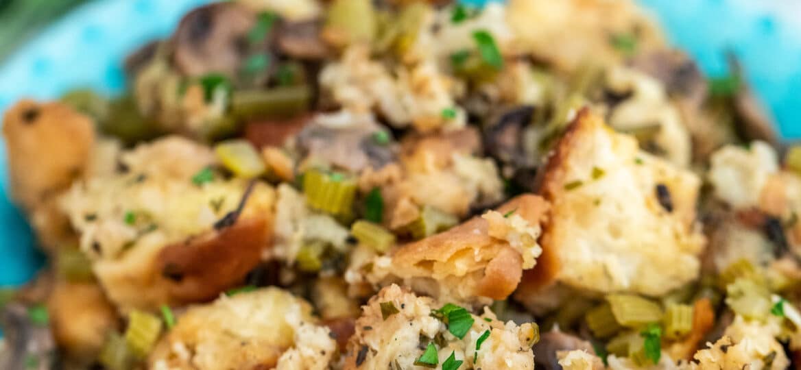 Crockpot Stuffing is moist, hearty, and perfectly seasoned! Easy to prepare using the slow cooker, it makes the perfect Thanksgiving side dish! #stuffing #crockpotrecipes #slowcooker #thanksgivingrecipes #sweetandsavorymeals