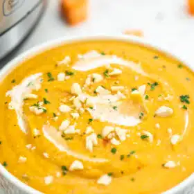 Instant Pot Sweet Potato Soup perfectly fits everybody's menu! It is creamy, hearty, and full of autumn flavors! Make it hassle-free with this recipe! #sweetpotatoes #sweetpotatosoup #souprecipes #pressurecooker #instantpot #sweetandsavorymeals