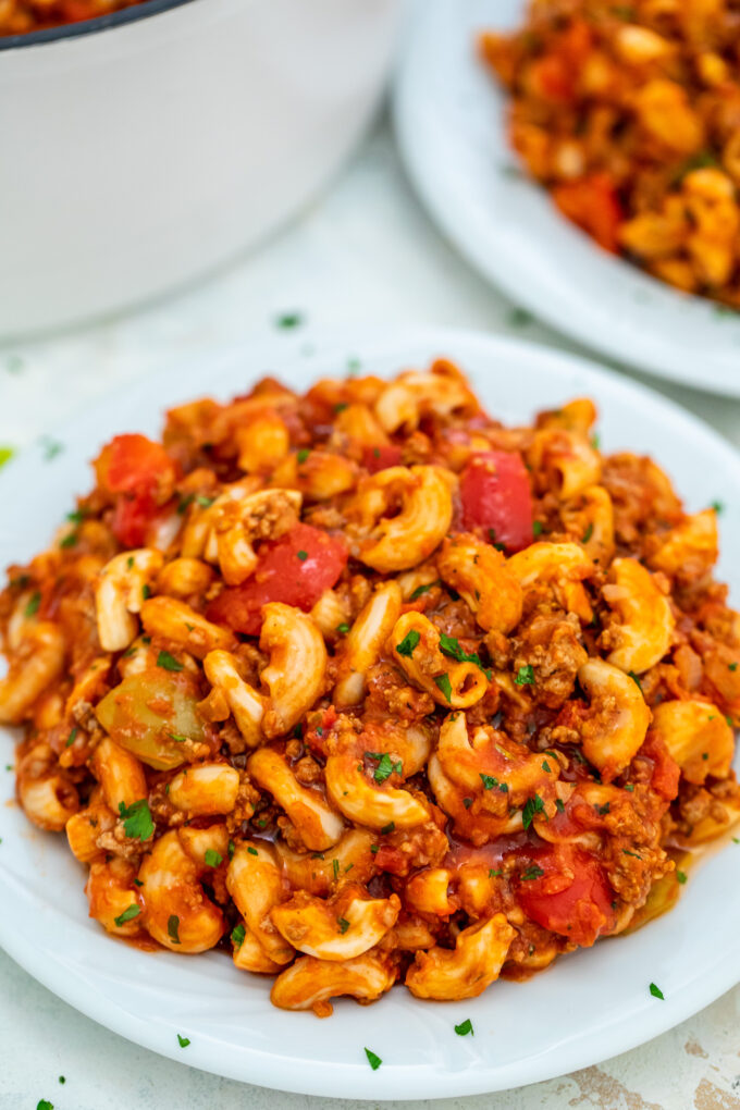 Goulash is a traditional Hungarian recipe that has an American version that is equally hearty and delicious! It is the perfect comfort food for the cold season! #goulash #onepotrecipe #pasta #sweetandsavorymeals #30minutemeals