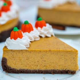 Pumpkin Cheesecake is super flavorful and delicious with just the right amount of pumpkin flavor. It is the best dessert you can have on your Thanksgiving table.  #pumpkin #pumpkincheesecake #cheesecake #thanksgiving #sweetandsavorymeals