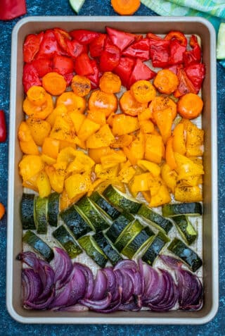 Rainbow Roasted Vegetables are a fun and easy way to feast on healthy fiber! Not only are they colorful, but they are flavorful and nutritious, too! #vegetables #rainbowvegetables #sidedish #vegetarianrecipes #sweetandsavorymeals