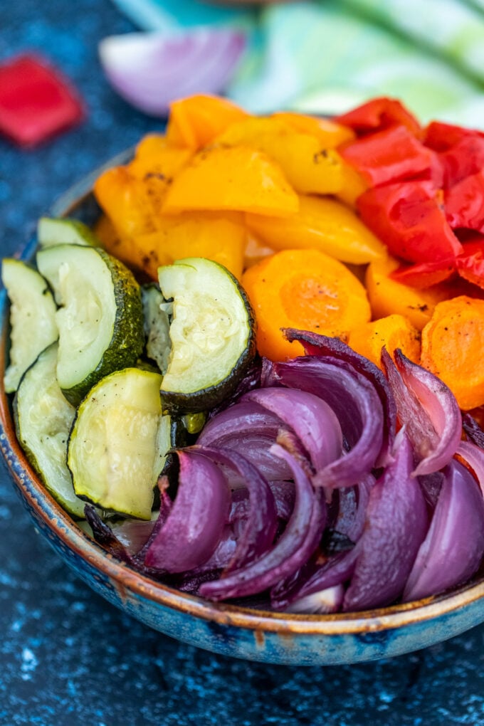 Rainbow Roasted Vegetables are a fun and easy way to feast on healthy fiber! Not only are they colorful, but they are flavorful and nutritious, too! #vegetables #rainbowvegetables #sidedish #vegetarianrecipes #sweetandsavorymeals