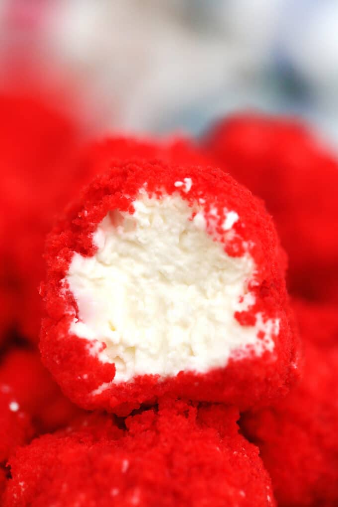 Red Velvet Cheesecake Bites are creamy and nothing but velvety! With their festive color and decadent taste, they make for a great dessert for any occasion! #cheesecake #cheesecakebites #sweetandsavorymeals #redvelvet #nobake