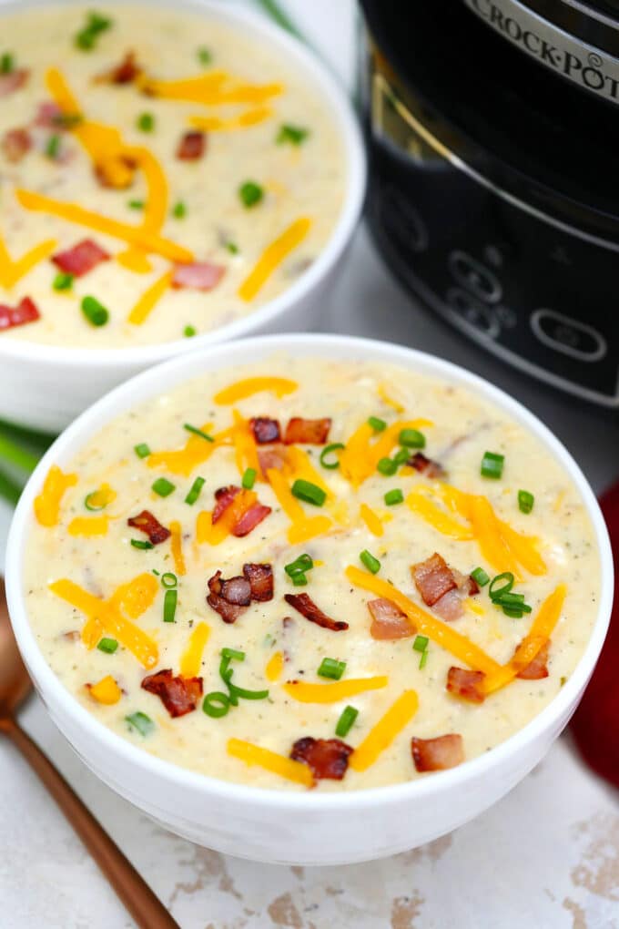 Slow Cooker Bacon Ranch Potato Soup gives a twist to the traditional version. It tastes amazing with the ranch flavor making it definitely worth a try! #soup #crockpotrecipes #slowcookerrecipes #sweetandsavorymeals #souprecipes