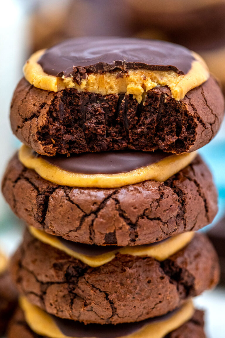 Buckeye Brownie Cookies are decadent pieces of brownie-like cookies, topped with peanut butter and chocolate! #cookies #christmascookies #christmasrecipes #sweetandsavorymeals #chocolate