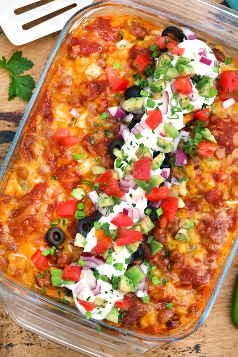 Chicken Enchilada Casserole has all the Mexican flavors of the enchilada minus the long prep time! #chicken #casserole #chickencasserole #chickenenchilada #sweetandsavorymeals