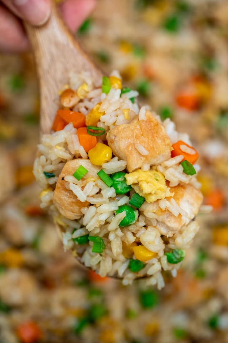 Chicken Fried Rice is a hearty and savory dinner option for the whole family! Follow this recipe for a homemade version of your favorite Chinese takeout! #chickenrecipes #asianrecipes #friedrice #sweetandsavorymeals #chineserecipes