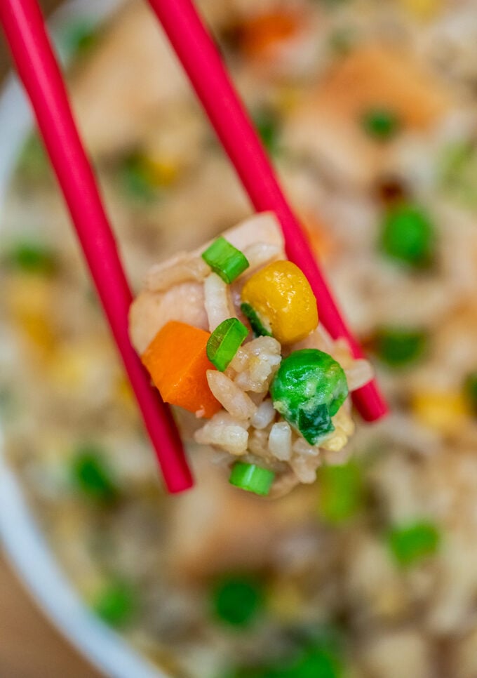 Chicken Fried Rice is a hearty and savory dinner option for the whole family! Follow this recipe for a homemade version of your favorite Chinese takeout! #chickenrecipes #asianrecipes #friedrice #sweetandsavorymeals #chineserecipes