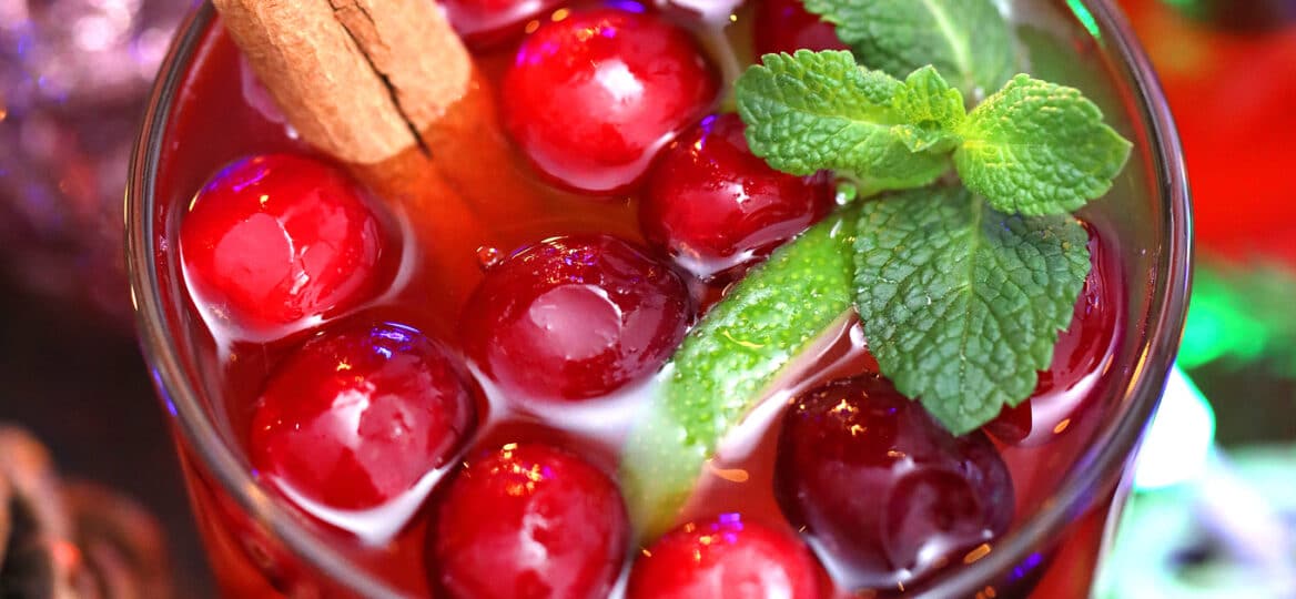 Christmas Punch is a festive, and refreshing drink that is made with pomegranate, lime, and cranberries, and ready in 5 minutes. #christmaspunch #punchrecipe #christmas #christmasrecipes #sweetandsavorymeals