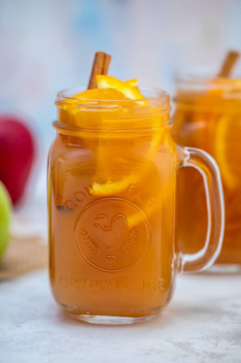 Homemade Apple Cider Recipe is made with apples, oranges, spices, water, and maple syrup. #cider #applecider #drinks #sweetandsavorymeals #fallrecipes