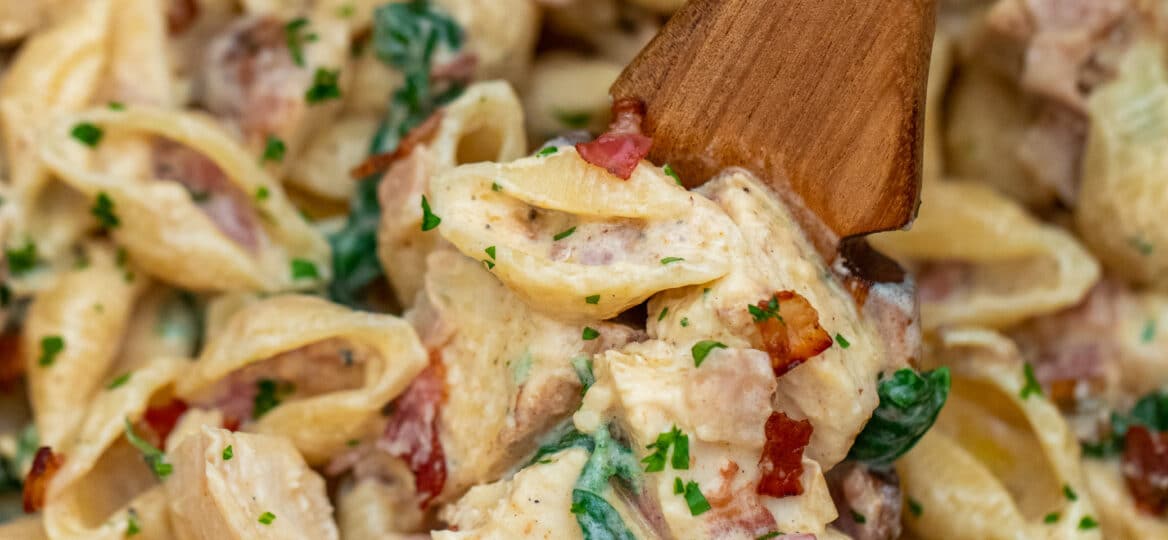 Instant Pot Chicken Bacon Ranch Pasta is a creamy and satisfying dish that the whole family will love! #pasta #instantpot #pressurecooker #sweetandsavorymeals #dinnerideas