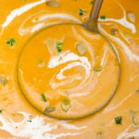 Instant Pot Roasted Butternut Squash Soup is creamy, hearty, and ready in just a few minutes in the pressure cooker! Making this winter favorite is so easy! #instantpot #pressurecooker #butternutsquash #souprecipes #sweetandsavorymeals