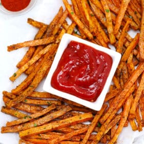Oven Roasted Sweet Potato Fries are crispy and savory! With proper technique, you can have this satisfying side dish ready in no time! #sweetpotatoes #fries #sidedish #sweetandsavorymeals #sweetpotatofries