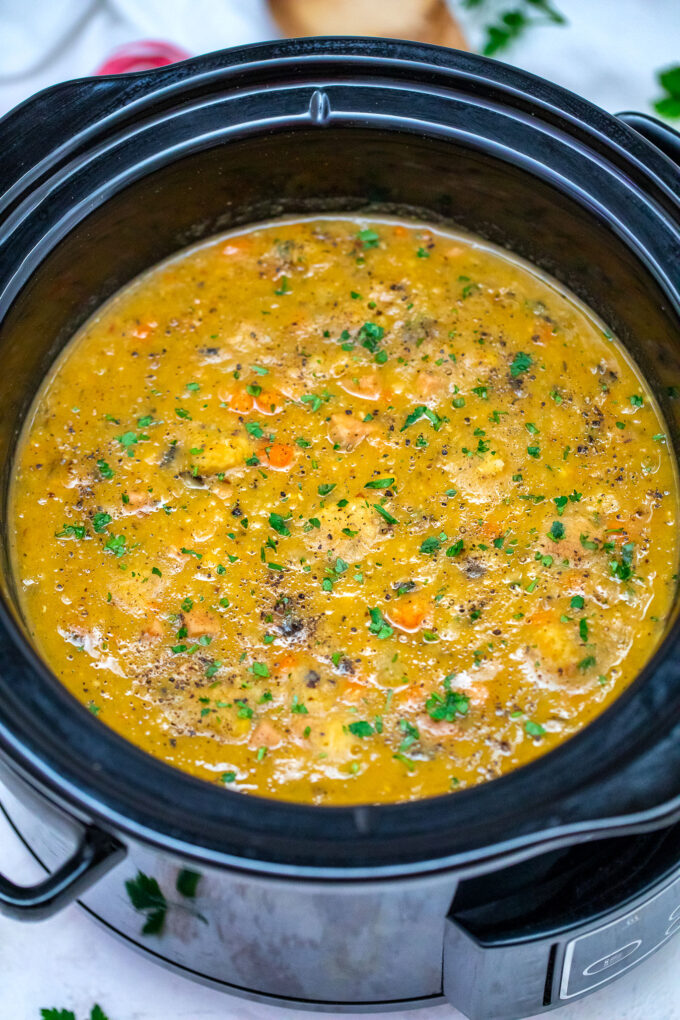 Slow Cooker Ham Split Pea Soup is comforting, warm, and healthful. #slowcookerrecipes #crockpot #splitpeasoup #hamsoup #sweetandsavorymeals #souprecipes