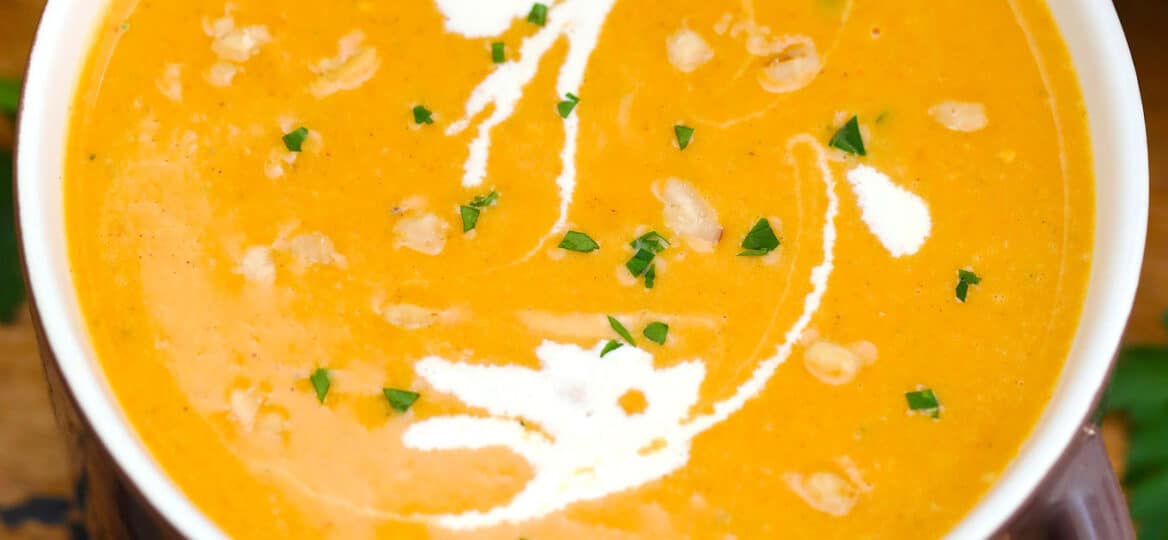 Slow Cooker Roasted Butternut Squash Soup is perfect for the busy home cook! Make this rich soup using the crockpot for a hassle-free dinner! #crockpotrecipes #slowcooker #butternutsquash #souprecipe #sweetandsavorymeals