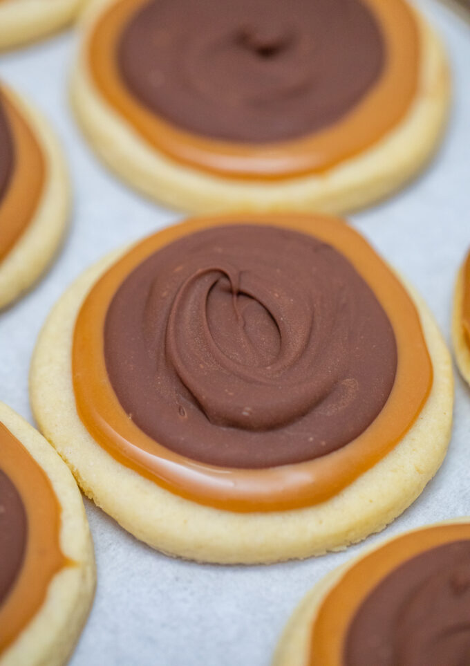 Twix Cookies prove that chocolate and caramel always go well together! #cookies #christmascookies #christmasrecipes #sweetandsavorymeals #twixcookies