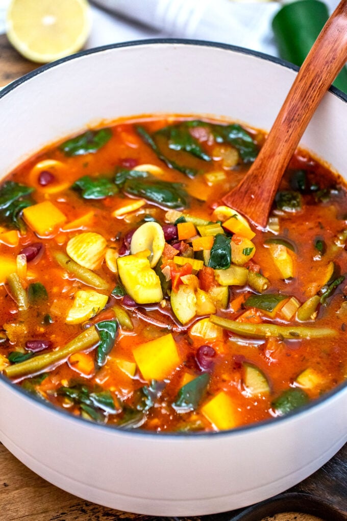 Vegetarian Minestrone Soup is your ultimate comfort food! #soup #minestronesoup #souprecipes #sweetandsavorymeals #vegetarianrecipes