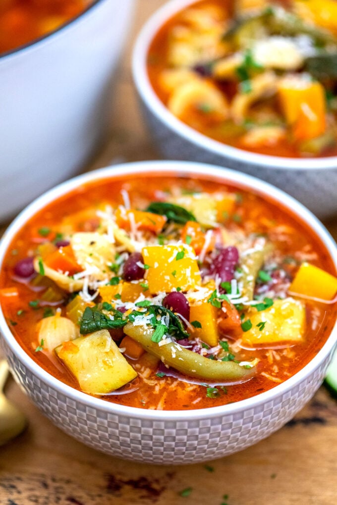 Vegetarian Minestrone Soup is your ultimate comfort food! #soup #minestronesoup #souprecipes #sweetandsavorymeals #vegetarianrecipes