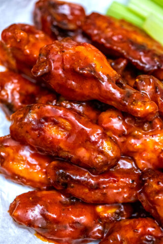 Baked Buffalo Wings are super crispy and coated in a delicious homemade spicy sauce. They are the perfect snack or party food! #buffalo #chickenwings #buffalosauce #partyfood #fingerfood #sweetandsavorymeals