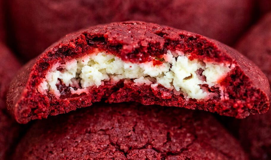 Cheesecake Stuffed Red Velvet Cookies are creamy, festive, and are the perfect treat to have during the holiday season. #cookies #redvelvet #christmasrecipes #valentinesday #sweetandsavorymeals