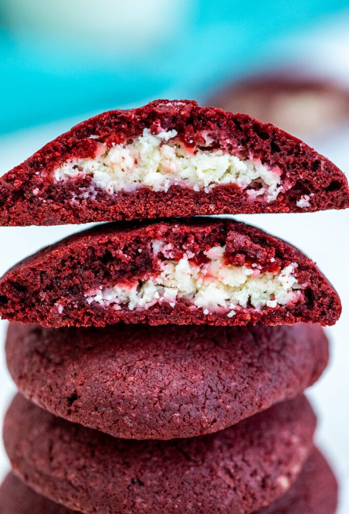 Cheesecake Stuffed Red Velvet Cookies are creamy, festive, and are the perfect treat to have during the holiday season. #cookies #redvelvet #christmasrecipes #valentinesday #sweetandsavorymeals