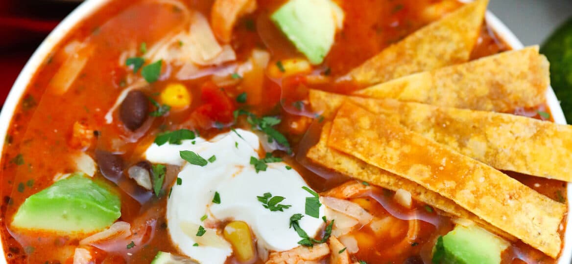 Instant Pot Chicken Tortilla Soup has all your favorite Mexican flavors in one appetizing dish! It is easily prepared using this pressure cooker recipe! #pressurecooker #instantpot #souprecipes #mexicanrecipes #sweetandsavorymeals