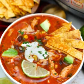 Instant Pot Chicken Tortilla Soup has all your favorite Mexican flavors in one appetizing dish! It is easily prepared using this pressure cooker recipe! #pressurecooker #instantpot #souprecipes #mexicanrecipes #sweetandsavorymeals