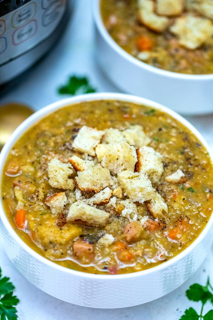 Instant Pot Ham Split Pea Soup is a quick and delicious way to use some leftover ham. It is a humble dish yet it is rich in flavor and nutrients! #souprecipes #instantpotrecipes #pressurecooker #ham #sweetandsavorymeals