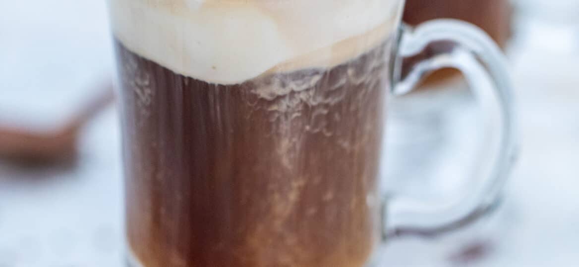 Irish Coffee Recipe is made with freshly brewed coffee, sugar, whiskey, and whipped cream. #irishcoffee #irishrecipes #irishfood #stpatricksday #sweetandsavorymeals #drinks