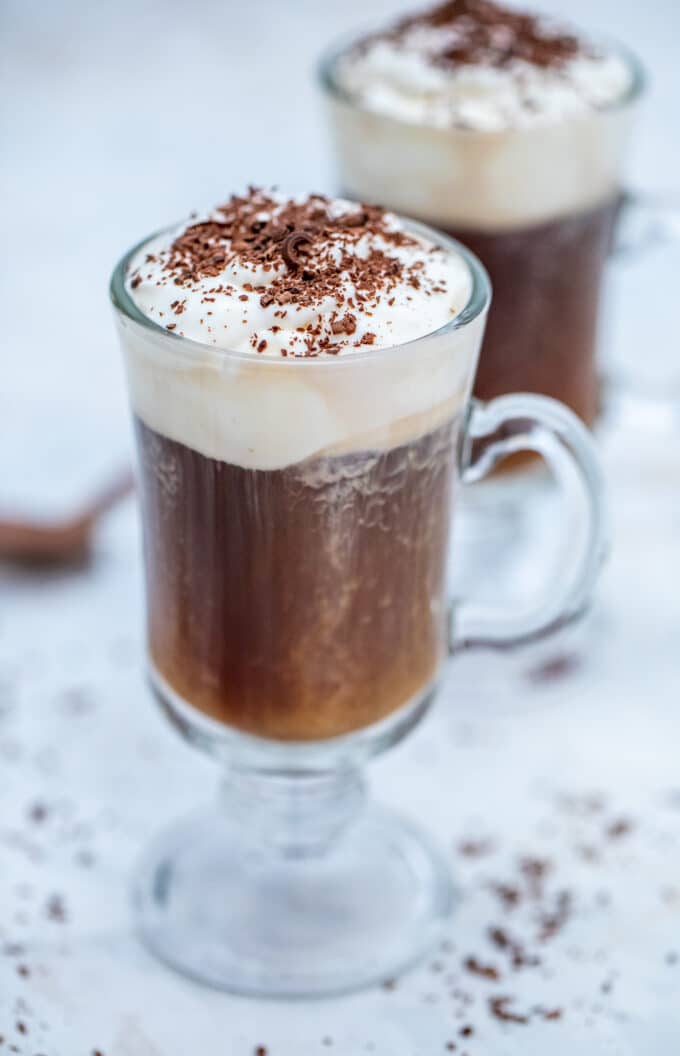 Irish Coffee Recipe is made with freshly brewed coffee, sugar, whiskey, and whipped cream. #irishcoffee #irishrecipes #irishfood #stpatricksday #sweetandsavorymeals #drinks