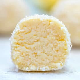 Keto Lemon Coconut Cheesecake Fat Bombs are a keto dieter's best friend! They are extremely decadent and rich just like any dessert but without sugar! #keto #ketorecipes #ketodesserts #sweetandsavorymeals #fatbombs