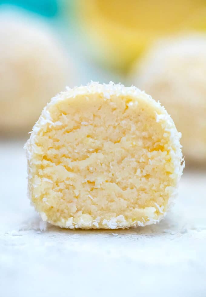 Keto Lemon Coconut Cheesecake Fat Bombs are a keto dieter's best friend! They are extremely decadent and rich just like any dessert but without sugar! #keto #ketorecipes #ketodesserts #sweetandsavorymeals #fatbombs
