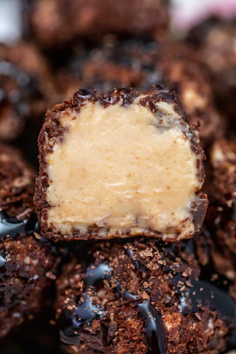 Keto Peanut Butter Cheesecake Fat Bombs explode with flavors that are too good to resist! #keto #fatbombs #ketodesserts #ketorecipes #sweetandsavorymeals