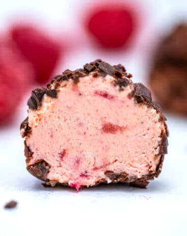 Keto Strawberry Cheesecake Fat Bombs can make you forget that you are avoiding carbs! Satisfy your cravings with this easy, low-carb and tasty treat! #ketorecipes #ketofatbombs #ketodesserts #sweetandsavorymeals #lowcarbdesserts