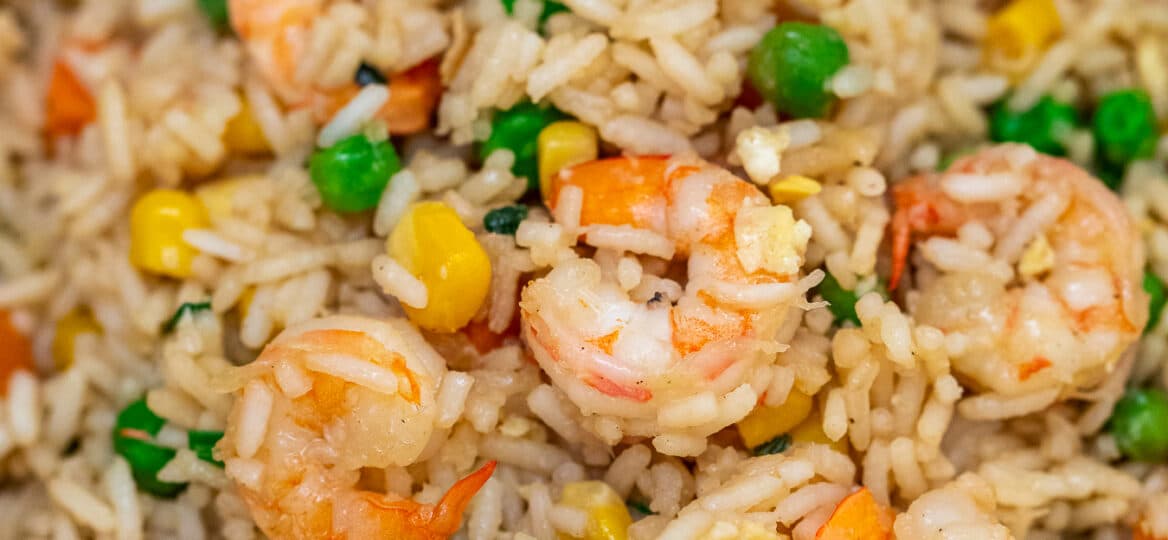 Shrimp Fried Rice is best made with leftovers and that makes this twice better than takeout! #shrimprecipes #shrimpfriedrice #friedrice #sweetandsavorymeals #chineserecipes