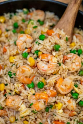 Shrimp Fried Rice is best made with leftovers and that makes this twice better than takeout! #shrimprecipes #shrimpfriedrice #friedrice #sweetandsavorymeals #chineserecipes