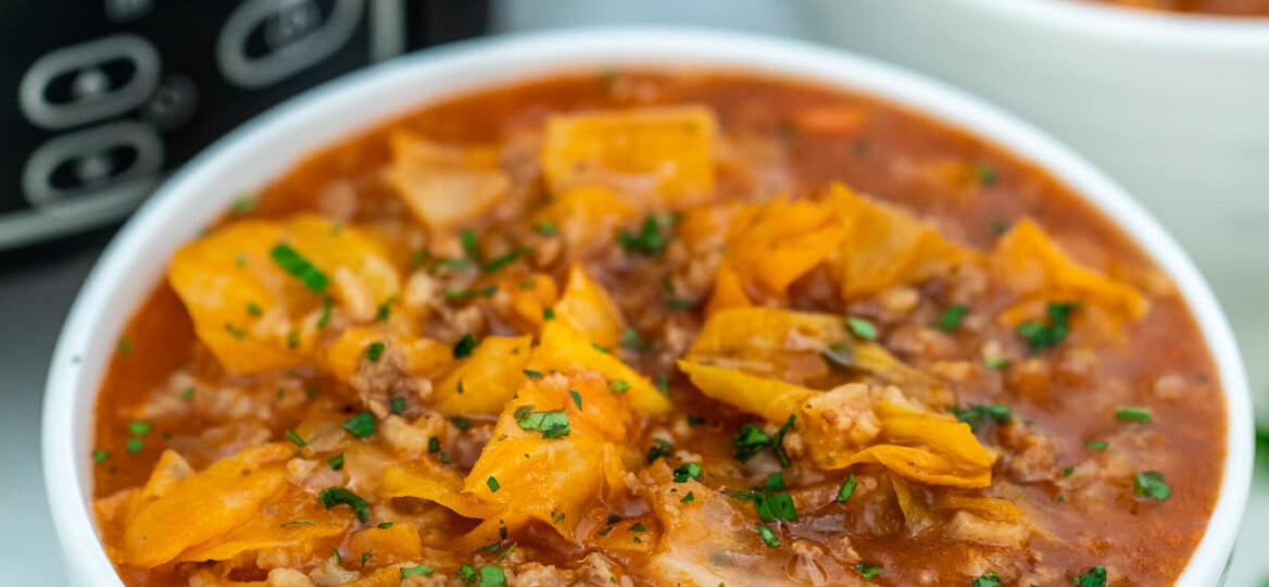 Slow Cooker Cabbage Roll Soup has all the flavors of cabbage rolls, without the fuss and effort! #slowcooker #crockpotrecipes #souprecipes #cabbagerollsoup #sweetandsavorymeals