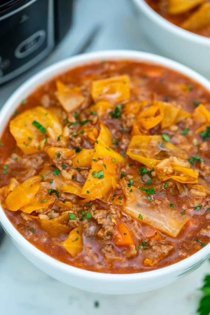 Slow Cooker Cabbage Roll Soup has all the flavors of cabbage rolls, without the fuss and effort! #slowcooker #crockpotrecipes #souprecipes #cabbagerollsoup #sweetandsavorymeals