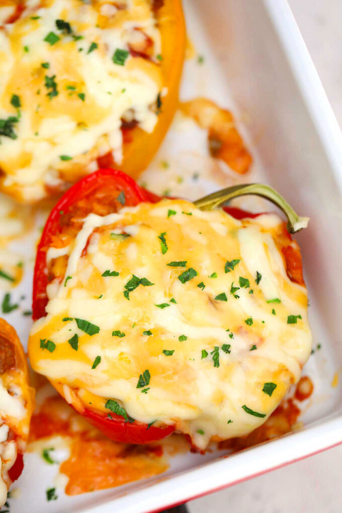 cheesy Mexican stuffed peppers in a baking pan