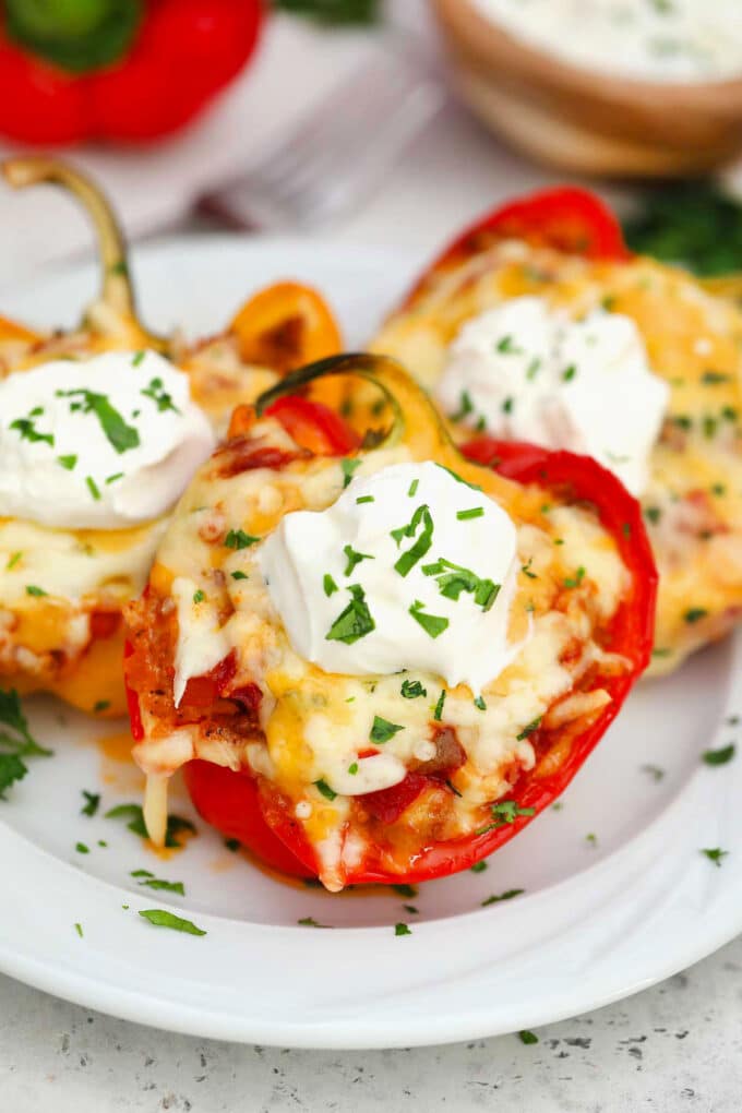 Mexican stuffed peppers topped with sour cream