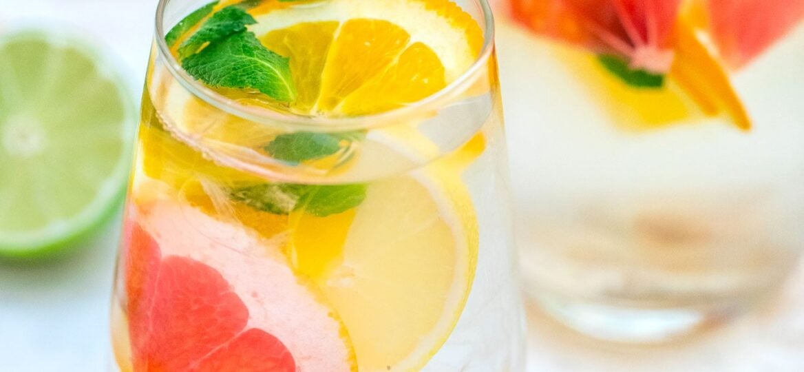 Detox Water is refreshingly good, thanks to the additional fruits and herbs! Say hello to feeling energized with this drink in your regimen! #detoxwater #detoxrecipes #sweetandsavorymeals #beverages #weightlossrecipes