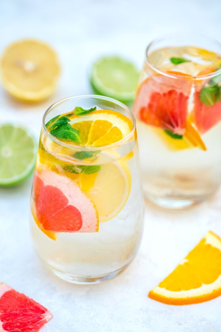 Detox Water is refreshingly good, thanks to the additional fruits and herbs! Say hello to feeling energized with this drink in your regimen! #detoxwater #detoxrecipes #sweetandsavorymeals #beverages #weightlossrecipes