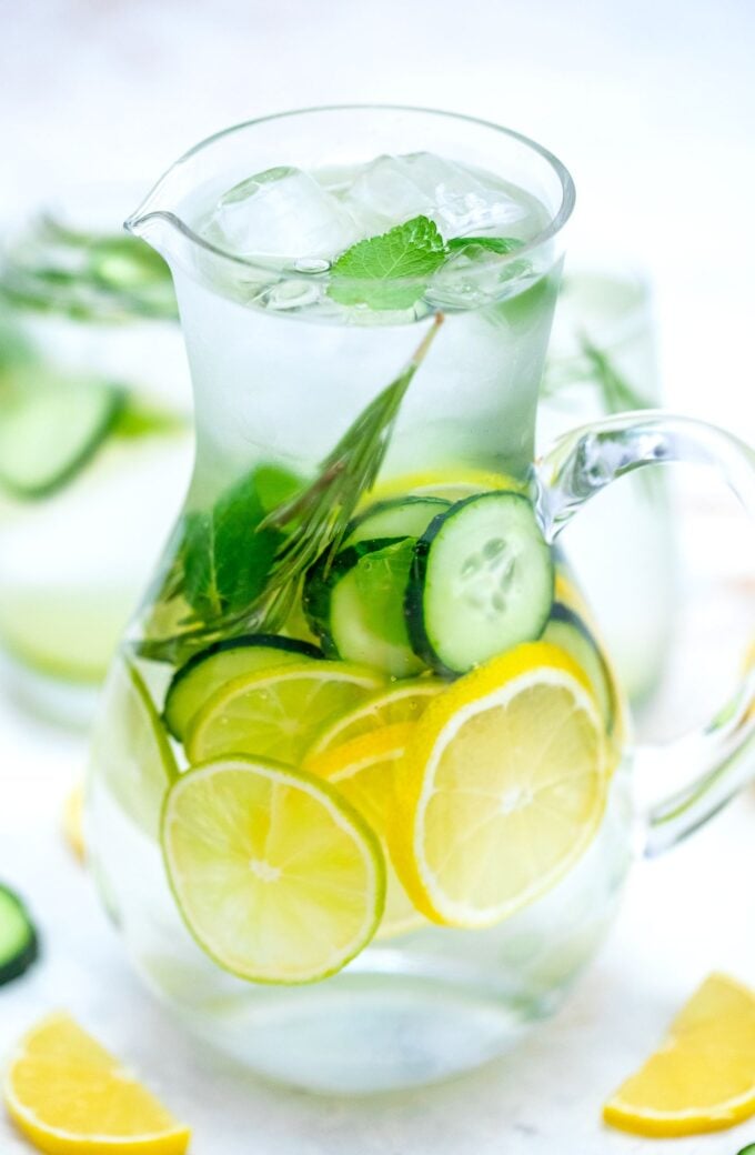 Detox Water is refreshingly good, thanks to the additional fruits and herbs! Say hello to feeling energized with this drink in your regimen! #detoxwater #detoxrecipes #sweetandsavorymeals #beverages #weightlossrecipes